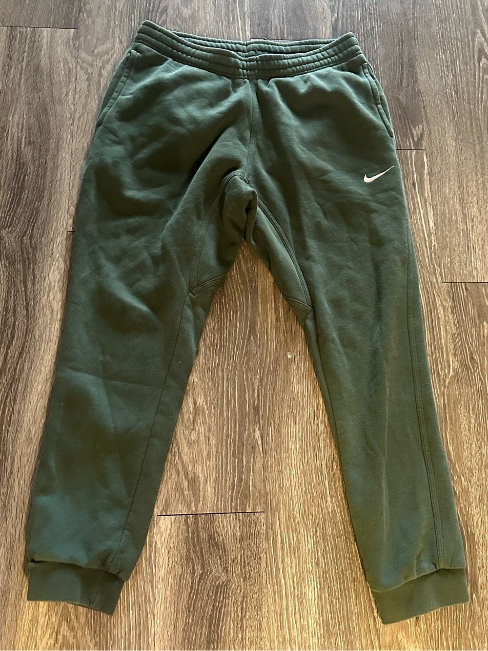 Men's dark green Nike cuffed sweatpants